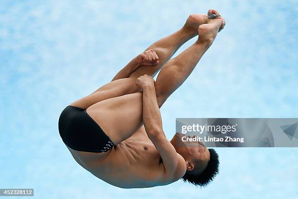 Ken Terauchi of Japan compete on in the Men's 3m Springboard Semi-Final during day four of the 19th FINA Diving World Cup at the Oriental Sports...