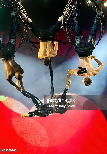 Nk hanging upside down as she performs in concert during 'The Truth About Love' tour at Bankers Life Fieldhouse on November 21, 2013 in Indianapolis,...