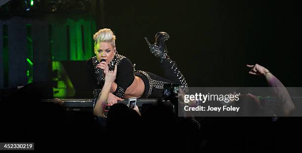 Nk performs in concert during 'The Truth About Love' tour at Bankers Life Fieldhouse on November 21, 2013 in Indianapolis, Indiana.
