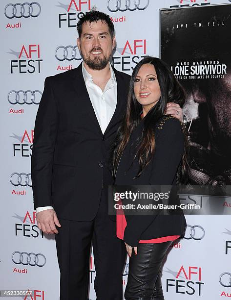 Retired petty officer 1st class Marcus Luttrell and wife Melanie Juneau attend the screening of 'Lone Survivor' at AFI FEST 2013 at the TCL Chinese...