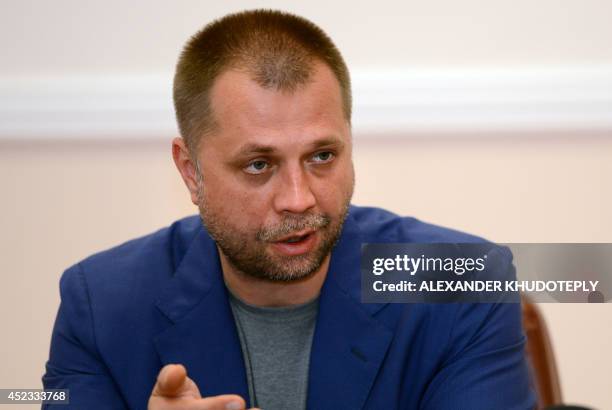 Self-proclaimed Prime Minister of the pro-Russian separatist "Donetsk People's Republic" Alexander Borodai holds a press-conference in the eastern...