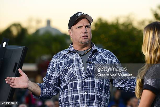 Garth Brooks visits "Extra" at Universal Studios Hollywood on November 27, 2013 in Universal City, California.