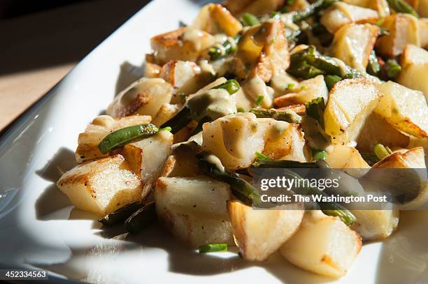 Roasted Potatoes and Green Beans with Mustard Drizzle are photographed for the Nourish column Thursday, November 8, 2012 in Vienna, VA.