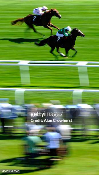 James Doyle riding Limato win The Rose Bowl Stakes at Newbury racecourse on July 18, 2014 in Newbury, England.