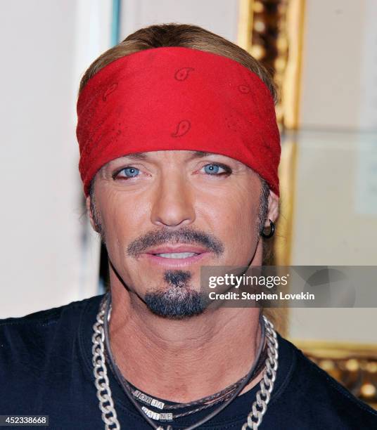 Singer/TV personality Bret Michaels poses for a photo after donating a guitar to Hard Rock Cafe at Hard Rock Cafe New York on July 18, 2014 in New...