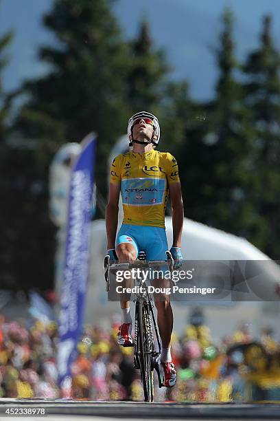 Vincenzo Nibali of Italy and the Astana Pro Team reacts as he defends the overall race leader's yellow jersey and wins the thirteenth stage of the...