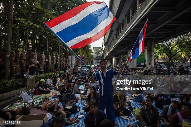 Protestors occupy the main road outside the police headquarter on November 28, 2013 in Bangkok, Thailand. Thailand's embattled Prime Minister...