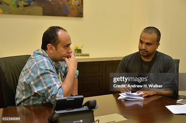 Director Maziar Miri talks to journalist Dean Denis at the "Painting Pool" during Day 3 of Ajyal Youth Film Festival on November 28, 2013 in Doha,...