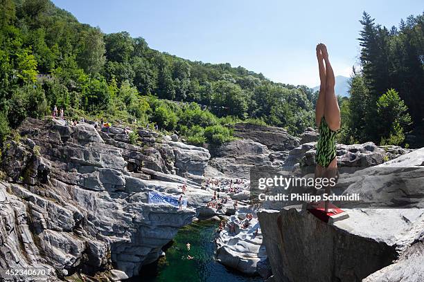 Anna Bader of Germany dives from a 20 metre rock during the training session of the Cliff Diving European Championship on July 18, 2014 in Ponte...