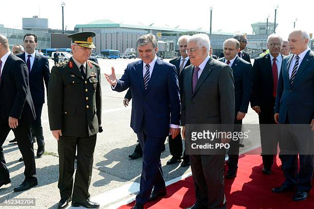 In this handout photo provided by the Palestinian Press Office , Palestinian President Mahmoud Abbas meets with Turkish President Abdullah Gul for a...
