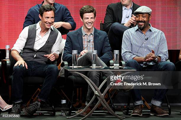 Actors Tom Cavanagh;Grant Gustin, and Jesse L. Martin speak onstage at the "The Flash" panel during the CW Network portion of the 2014 Summer...