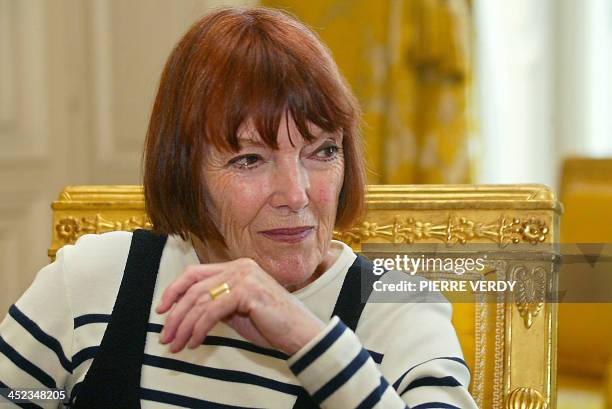 British stylist Mary Quant is seen, 17 June 2004 during an interview in Paris. - Quant introduced both the mini skirt and tights, which replaced...