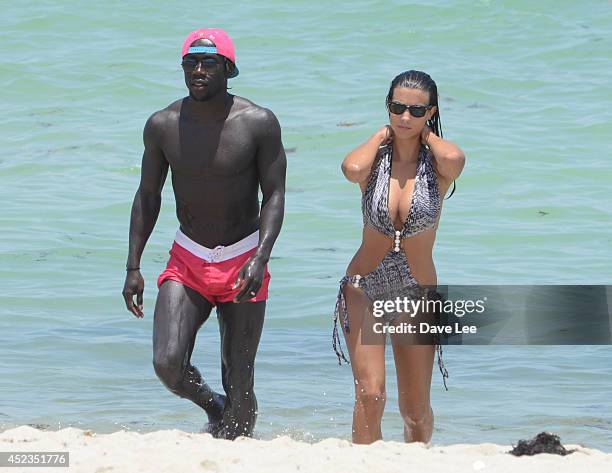 Bacary Sagna and Ludivine Kadri Sagna are sighted on Miami Beach at the W Hotel. On July 18, 2014 in Miami, Florida.