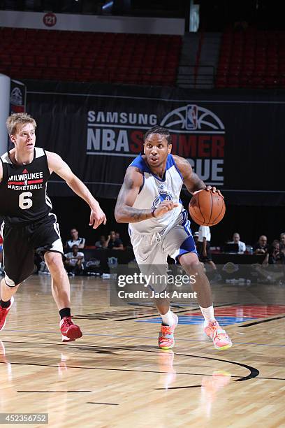 Rodney McGruder of the Golden State Warriors drives against the Milwaukee Bucks at the Samsung NBA Summer League 2014 on July 18, 2014 at the Thomas...