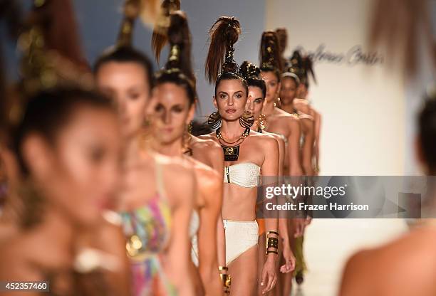 Models walk the runway during the Dolores Cortes show with TRESemme at Mercedes-Benz Fashion Week Swim 2015 at Cabana Grande at The Raleigh on July...