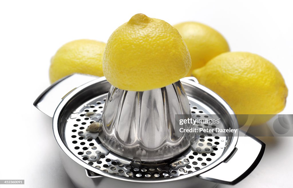 Lemon squeezer and lemons