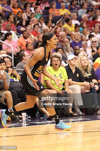 Skylar Diggins of the Western Conference All-Stars reacts during All-Star Practice and Media Availability on July 18, 2014 at US Airways Center in...