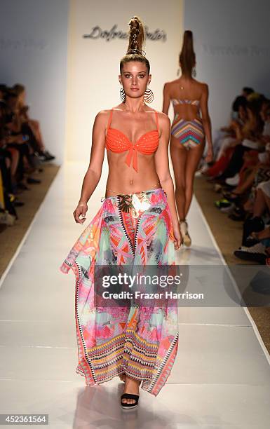 Model walks the runway at the Dolores Cortes fashion show during Mercedes-Benz Fashion Week Swim 2015 at The Raleigh on July 18, 2014 in Miami Beach,...