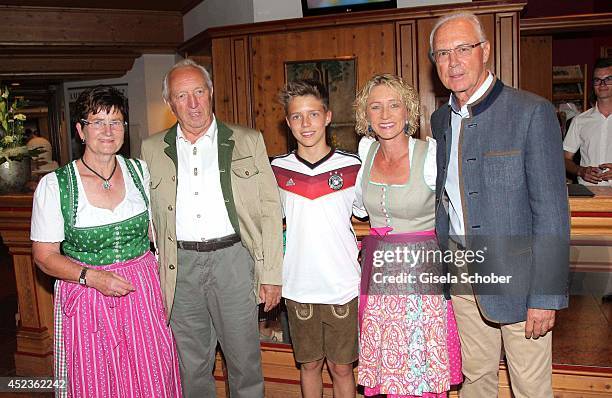 Gerhard Burmester and Margret Burmester , Joel Maximilian Beckenbauer, Heidi Beckenbauer and husband Franz Beckenbauer attend the get together at...