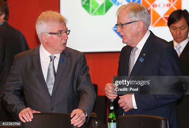 Australia's Minister for Trade and Investment Andrew Robb right, and New Zealand counterpart Tim Groser chat during the G20 Trade Ministers meeting...