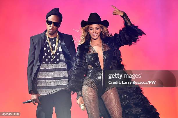 Jay-Z and Beyonce perform during the "On The Run Tour: Beyonce And Jay-Z" at Minute Maid Park on July 18, 2014 in Houston, Texas.