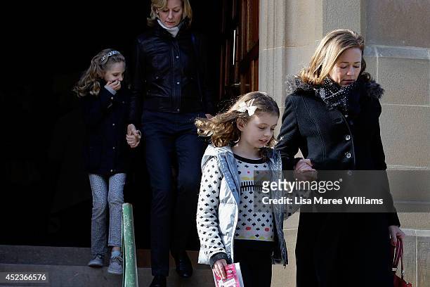 Mourners gather outside Saint Mary Magdalene Catholic Church following a service in memory of Sister Philomene Tiernan on July 19, 2014 in Sydney,...