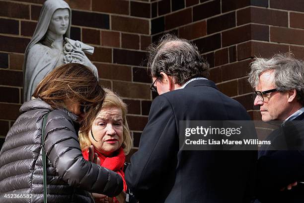Kincoppal Rose Bay Principle Hilary Johnston-Croke is comforted outside Saint Mary Magdalene Catholic Church following a service in memory of Sister...