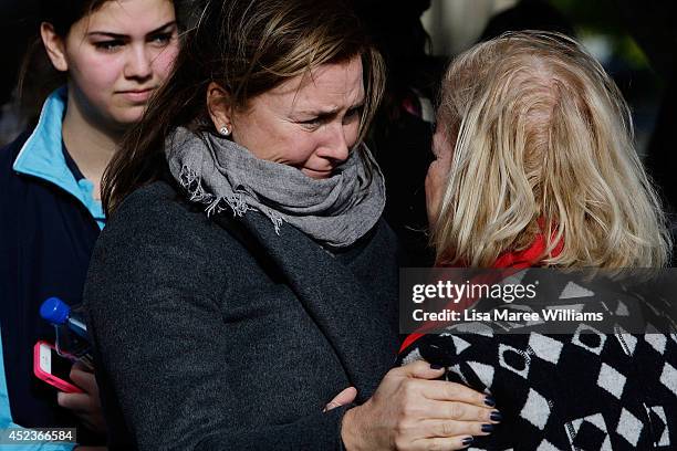 Kincoppal Rose Bay Principle Hilary Johnston-Croke is comforted outside Saint Mary Magdalene Catholic Church following a service in memory of Sister...