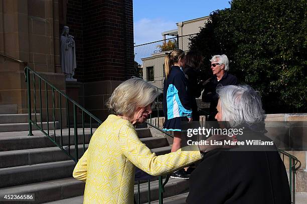 Mourners gather outside Saint Mary Magdalene Catholic Church following a service in memory of Sister Philomene Tiernan on July 19, 2014 in Sydney,...