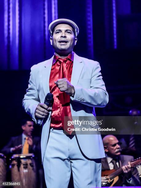 Carlos Calunga performs on stage with the Buena Vista Social Club at the Royal Albert Hall on October 21, 2013 in London, England.