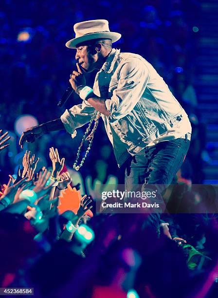 Producer/singer Pharrell Williams performs at the Nickelodeon Kids' Choice Sports Awards 2014 at UCLA's Pauley Pavilion on July 17, 2014 in Los...