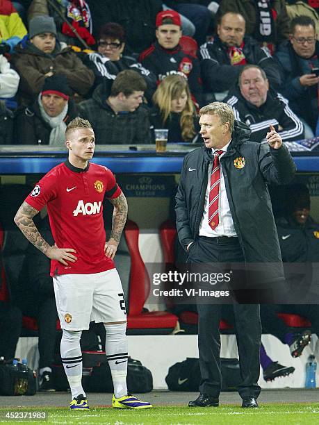 Alexander Buttner of Manchester Unite, coach David Moyes of Manchester United during the Champions League match between Bayer Leverkusen and...