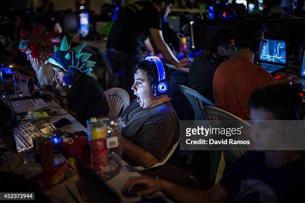Participant plays on his computer during the DreamHack Valencia 2014 on July 18, 2014 in Valencia, Spain. Dreamhack Valencia is one of the European...