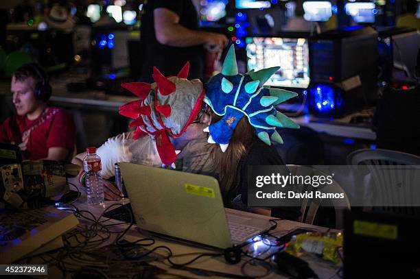 Participants kiss each other during the DreamHack Valencia 2014 on July 18, 2014 in Valencia, Spain. Dreamhack Valencia is one of the European stops...