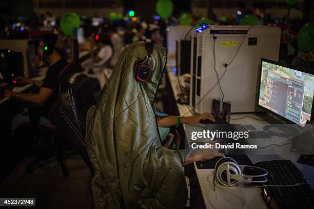 Participant plays on his computer during the DreamHack Valencia 2014 on July 18, 2014 in Valencia, Spain. Dreamhack Valencia is one of the European...