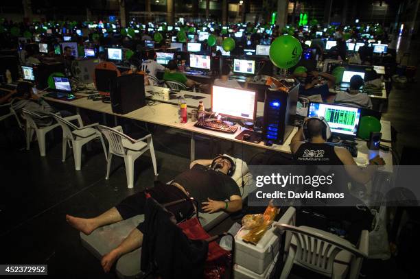 Participant spleeps during the DreamHack Valencia 2014 on July 18, 2014 in Valencia, Spain. Dreamhack Valencia is one of the European stops from the...