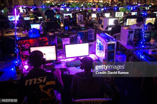 Participants play on their computers during the DreamHack Valencia 2014 on July 18, 2014 in Valencia, Spain. Dreamhack Valencia is one of the...