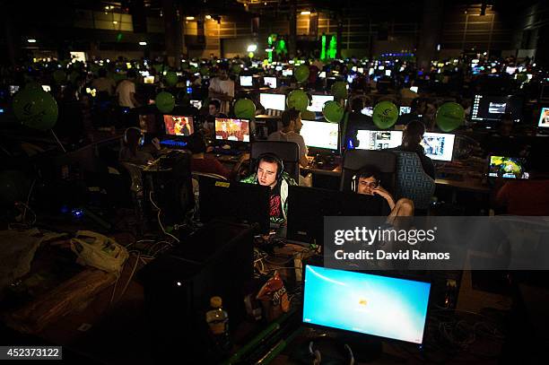 Participants play on their computers during the DreamHack Valencia 2014 on July 18, 2014 in Valencia, Spain. Dreamhack Valencia is one of the...