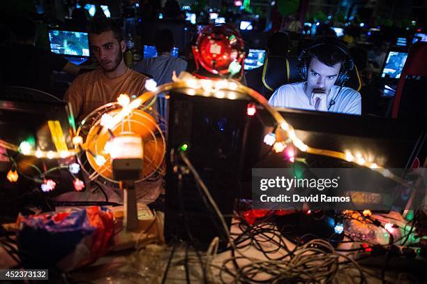 Participant plays on his computer during the DreamHack Valencia 2014 on July 18, 2014 in Valencia, Spain. Dreamhack Valencia is one of the European...