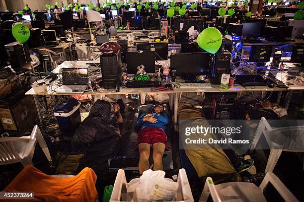 Participants spleep after spending the night at the LAN area during the DreamHack Valencia 2014 on July 19, 2014 in Valencia, Spain. Dreamhack...