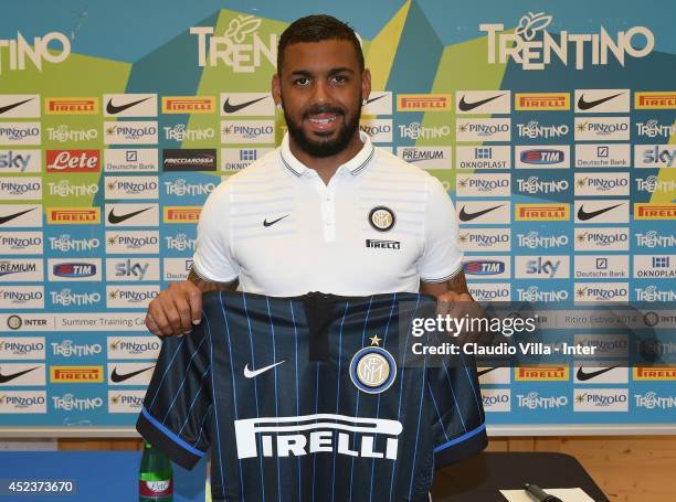 New signing Yann M'Vila poses for photographs during the press conference on July 19, 2014 in Pinzolo near Trento, Italy.