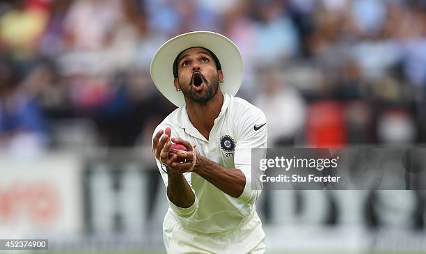 India fielder Shikhar Dhawan catches Matt Prior during day three of 2nd Investec Test match between England and India at Lord's Cricket Ground on...