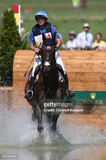Karin Donckers of Belgium rides on Fletcha van't Verahof during the DHL Price Cross Country Test at Aachener Soers on July 19, 2014 in Aachen,...