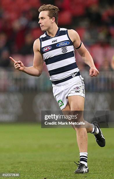 Mitch Duncan of the Cats celebrates after kicking a goal during the round 18 AFL match between the Greater Western Sydney Giants and the Geelong Cats...