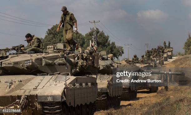 Israeli tanks are lined up near the Israeli-Gaza border during an operation on July 19, 2014 near Sderot, Israel. As operation "Protective Edge"...