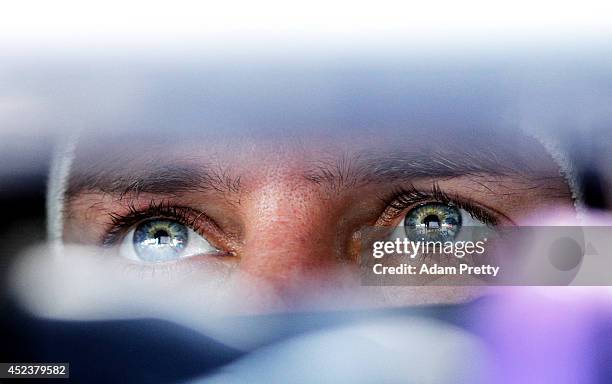 Sebastian Vettel of Germany and Infiniti Red Bull Racing sits in his car in the garage during final practice ahead of the German Grand Prix at...