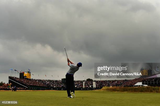 Rory McIlroy of Northern Ireland plays his second shot on the 18th hole during the third round of The 143rd Open Championship at Royal Liverpool on...
