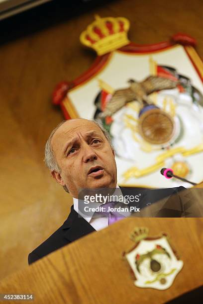 Foreign Minister of France Laurent Fabius holds a press conference with his Jordanian counterpart Nasser Judeh upon his arrival for talks in Amman,...