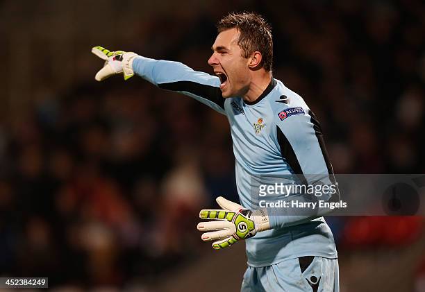 Real Betis goalkeeper Stephan Andersen shouts to his players during the UEFA Europa League Group I match between Olympique Lyonnais and Real Betis...