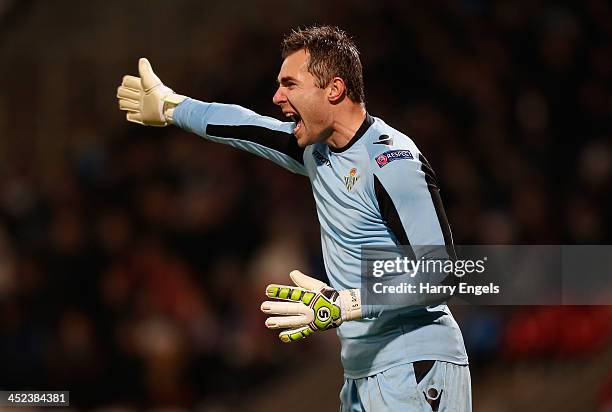 Real Betis goalkeeper Stephan Andersen shouts to his players during the UEFA Europa League Group I match between Olympique Lyonnais and Real Betis...